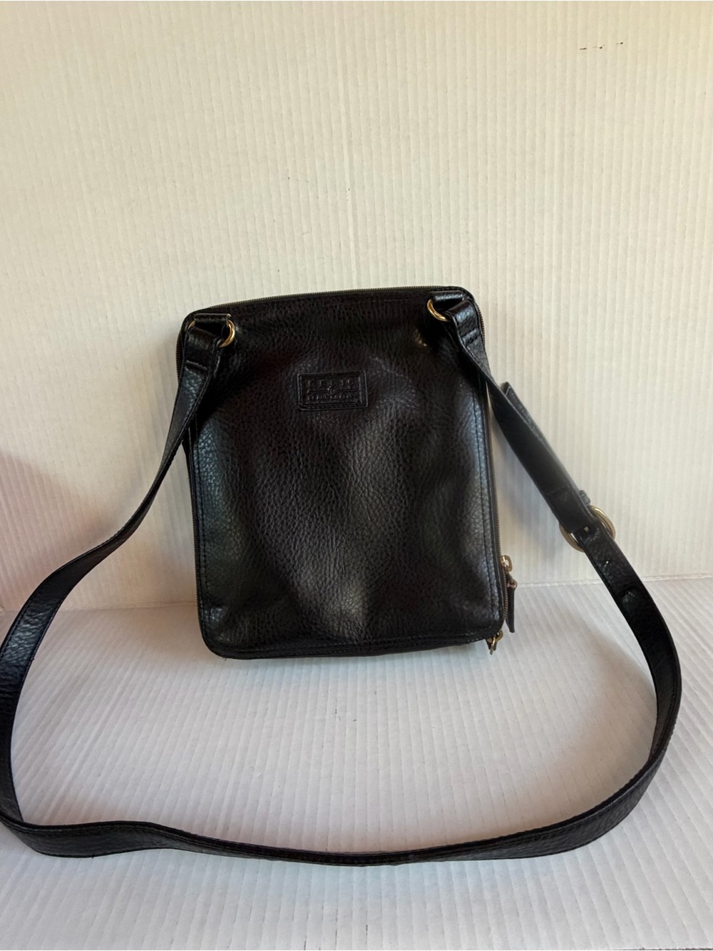 Relic Black Pebbled Crossbody Bag with Embossed Logo